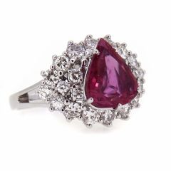 Anillo zafiro rosa talla trillion y diamantes
