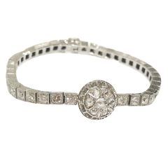 Pulsera riviere con centro de diamantes