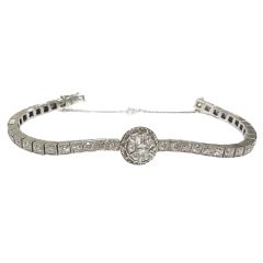 Pulsera riviere con centro de diamantes