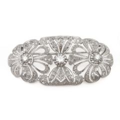 Broche floral con diamantes